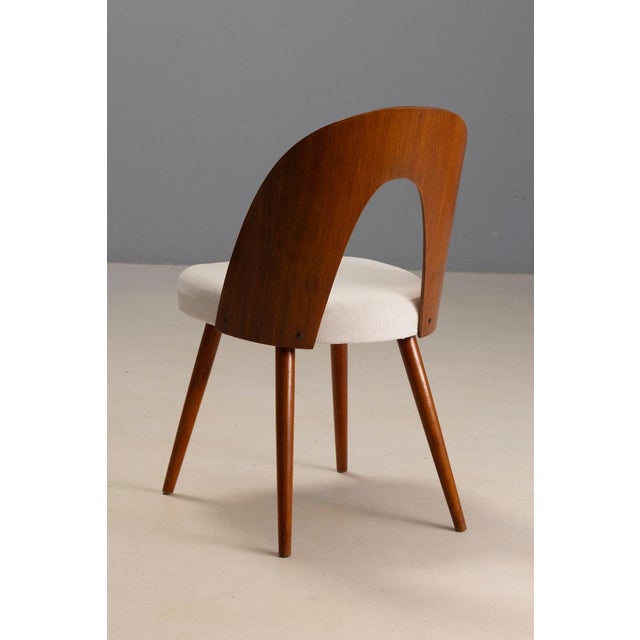 Set of four dining chairs designed by Antonín Šuman in Czechoslovakia during the 1960s. The design reflects the clarity...
