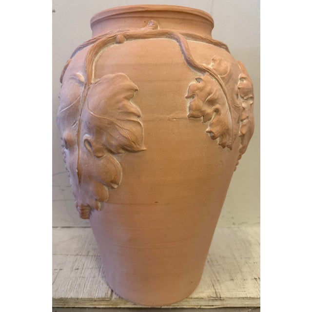 Vintage handcrafted plaster vase featuring a high-relief, embossed design of grape clusters and leaves. Beautiful...