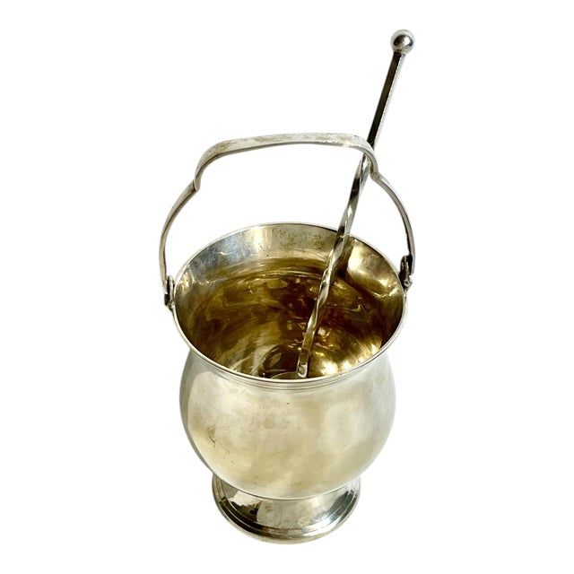 Elevate your barware collection with this elegant vintage French Art Deco silver plate ice bucket, complete with its...