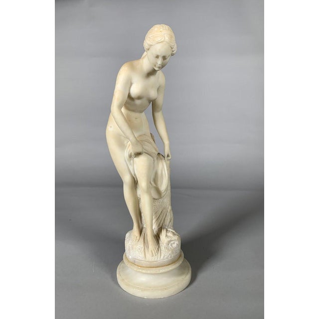 White marble sculpture of Diana at her bath, after Falconet (1716-1791). French work, mid-19th century, in the style of...