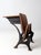 An early 20th century Chicago cast iron and wood school desk with arched iron supports and beautifully aged wood. The...