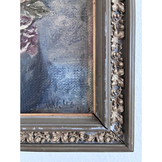 Original vintage oil painting from around the 1960s showing a still life of roses arranged in a dark blue vase. The softly...