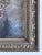 Original vintage oil painting from around the 1960s showing a still life of roses arranged in a dark blue vase. The softly...