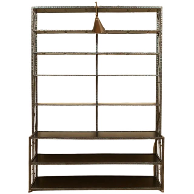Contemporary Ebonized and Patinated-Bronze Eight-Tier Étagères fitted with a metal reading lamp on the top shelf. The...