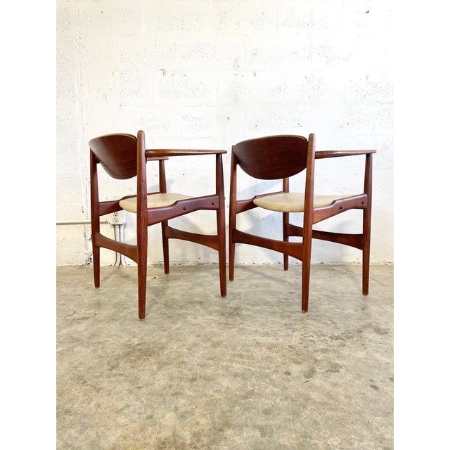 Danish modern design by Arne Hovmand Olsen from the 1950's. The backs are hinged to contour the sitter's back. New...