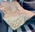 The Sethi & Sethi Designs Hand Pleated Tuck 100% Silk Decorative Throw is a large rectangular item made from luxurious...