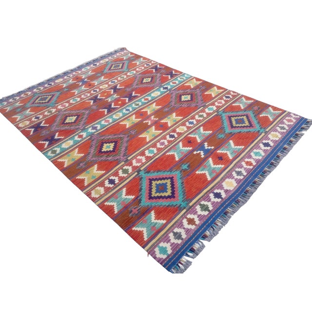 Bring the rich heritage of traditional Anatolian craftsmanship into your living space with this striking, hand-woven...