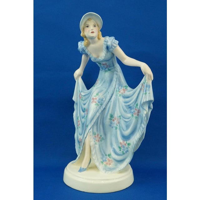 Description of the item: Beautiful polychrome ceramic sculpture, glazed with a third firing. Depicting a large lady with a...