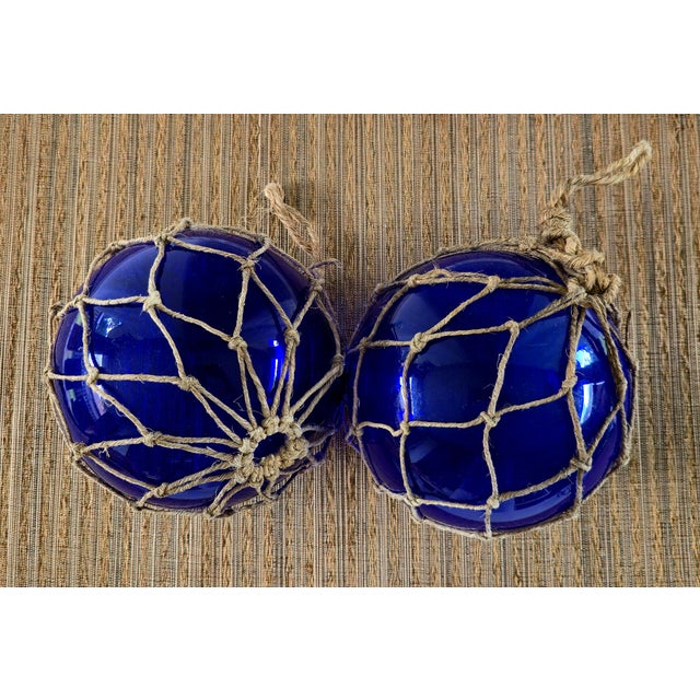 Mid 20th Century Vintage Pair of Rare 8" Cobalt Blue Hand-Blown Glass Fishing Floats · Original Jute Net For Sale - Image 5 of 7