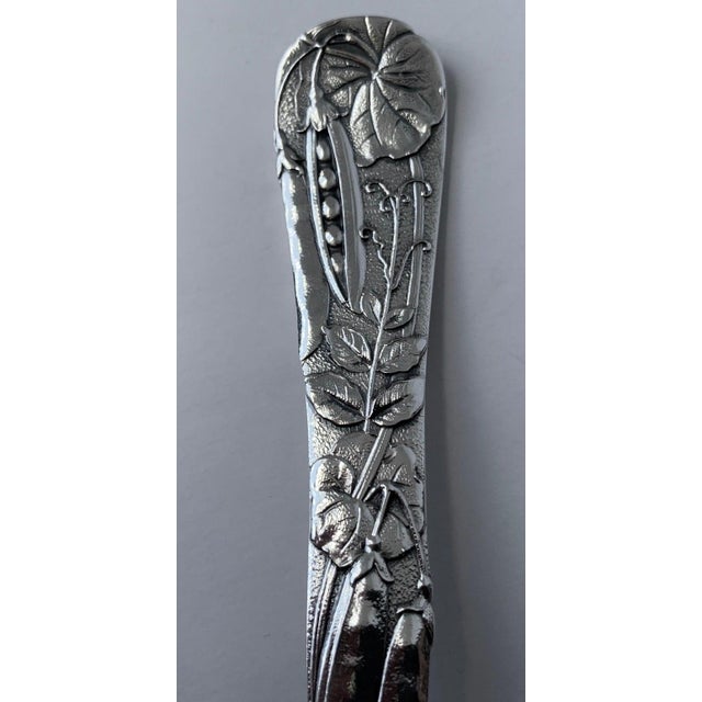 Tiffany's "Vine" pattern is not just one pattern, but thirteen different motifs of flowers, grains, vegetables and fruits....