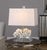 Taupe-ivory coral sculpture paired with a layered thick crystal foot and paired with brushed nickel plated accents. The...
