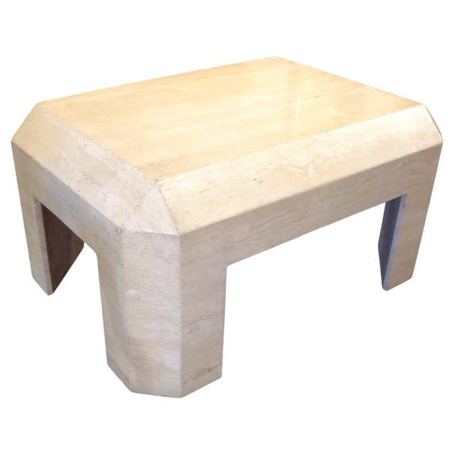 A modern and minimalist travertine coffee table with wonderful form and proportions. Beautifully-constructed and...