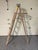Elevate your rustic farmhouse or industrial loft decor with this authentic vintage 6-foot Werner wooden step ladder....