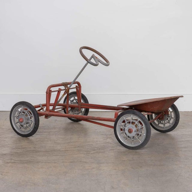 Vintage Start Kart pedal go-kart from the United States, 1960s. Original steel frame, pressed metal seat, and cast...