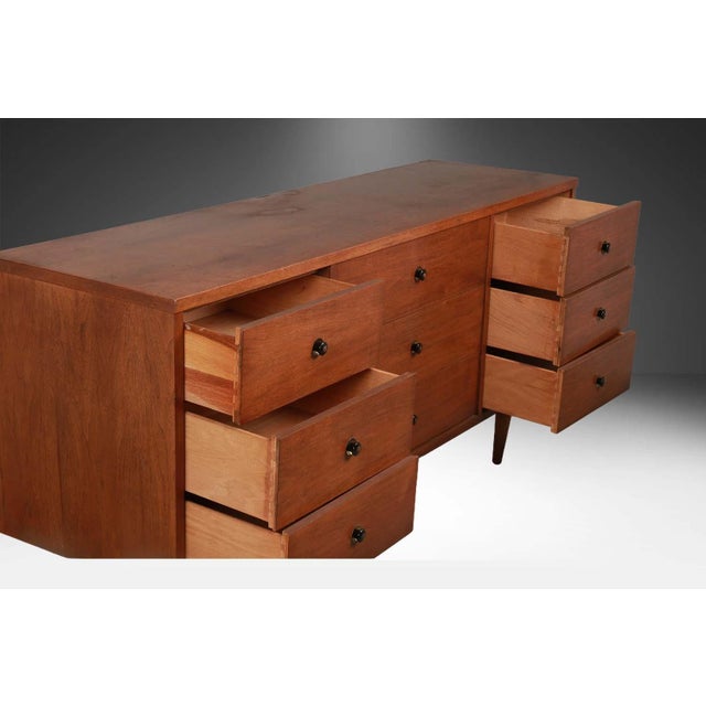 Beautiful Mid-Century Modern nine drawer Dresser by Bassett. This is a beautiful example of Mid-Century craftsmanship,...