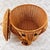 This storage container is hand-woven and shaped by craftsmen from natural rattan, creating a three-dimensional elephant...