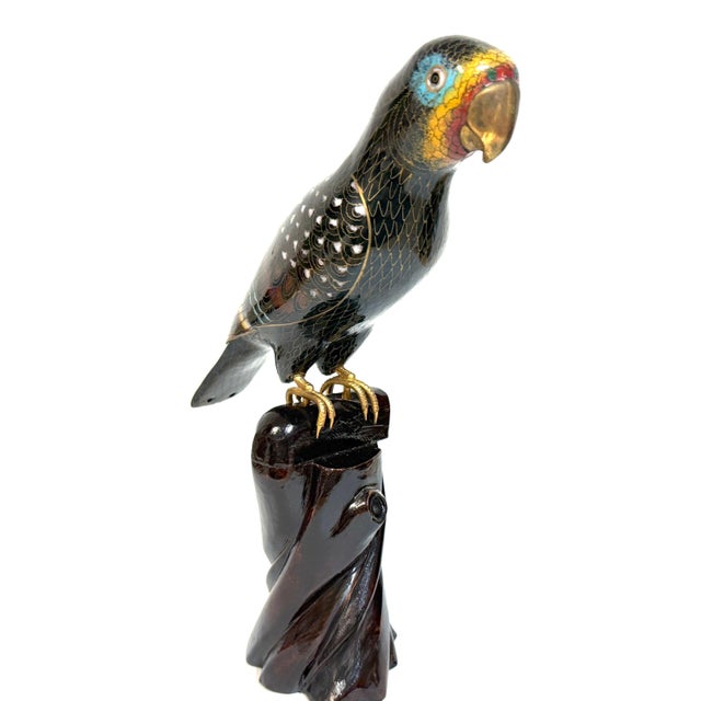 Chinese Cloisonné Parrot on Carved Hardwood Tree Trunk Base Chinese, Circa 1960, Two pieces: a cloisonné parrot and carved...