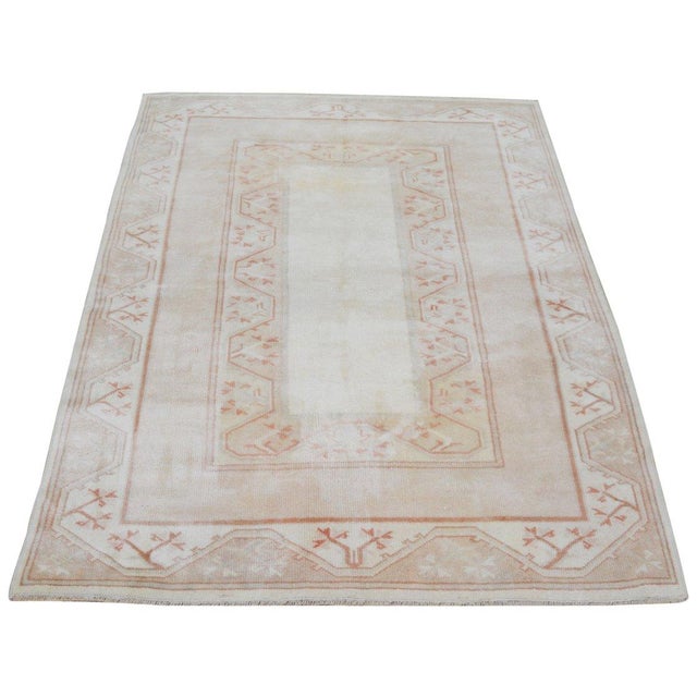 Hand-knotted with care using traditional rug-making techniques, this wool rug blends timeless craftsmanship with a modern...