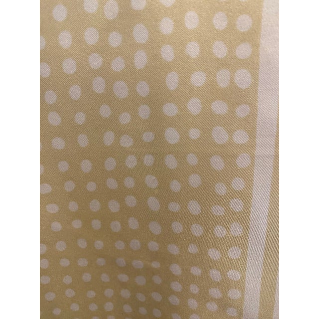 This is long lumbar pillow cover features a petite dot patter with a framed border. The color is pale lemon yellow---...
