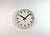This large wall clock was produced by Pragotron in former Czechoslovakia during the 1960s. It features a beige bakelite...