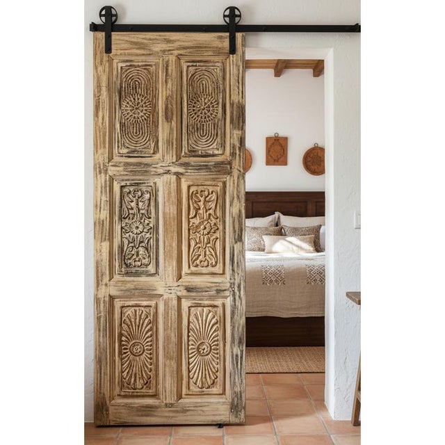 An elegant pair of vintage French-inspired bedroom doors featuring intricate hand-carved floral detailing Crafted from...