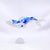 This artwork features a stylized fish, elegantly rendered in a glossy resin cast that captures the fluidity of movement....