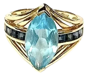 Light Blue Topaz With Dark Blue Topaz Baguettes 14k Yellow Gold Ring