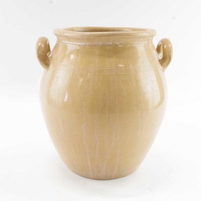 This substantial Swedish ceramic vessel is a classic and highly decorative example of Scandinavian utilitarian stoneware....
