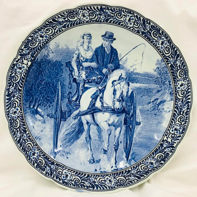 One is marked Delft,while the other has an unnamed mark. See photos for marks. Smaller platter (marked Delft) measures...