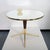Wood and brass table with mirrored top in the style of Cesare Lacca. Fully restored and refinished.