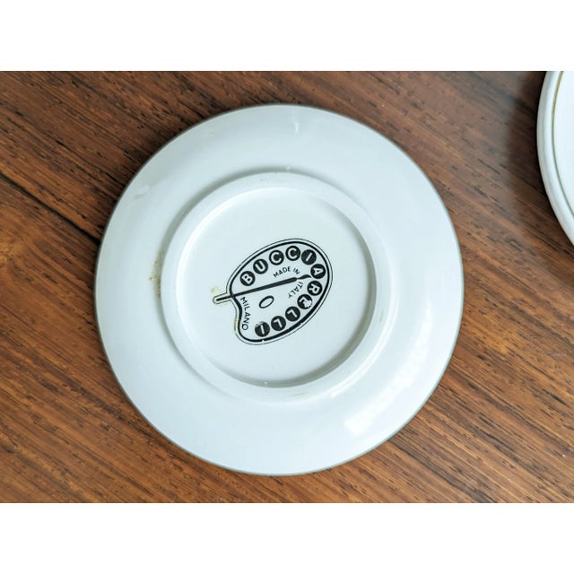 This Bucciarelli mushrooms set includes 7 coasters, . These are in pretty good condition considering their age, with...