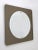 Imposing and elegant circular wall mirror in the center in silver glass, on smoky bronze colored mirrored glass in a...