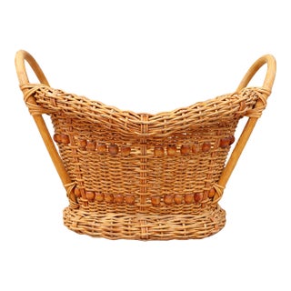 Vintage 1970s Honey-Toned Wicker Basket With Wood Bead Detail & Sculptural Handles For Sale