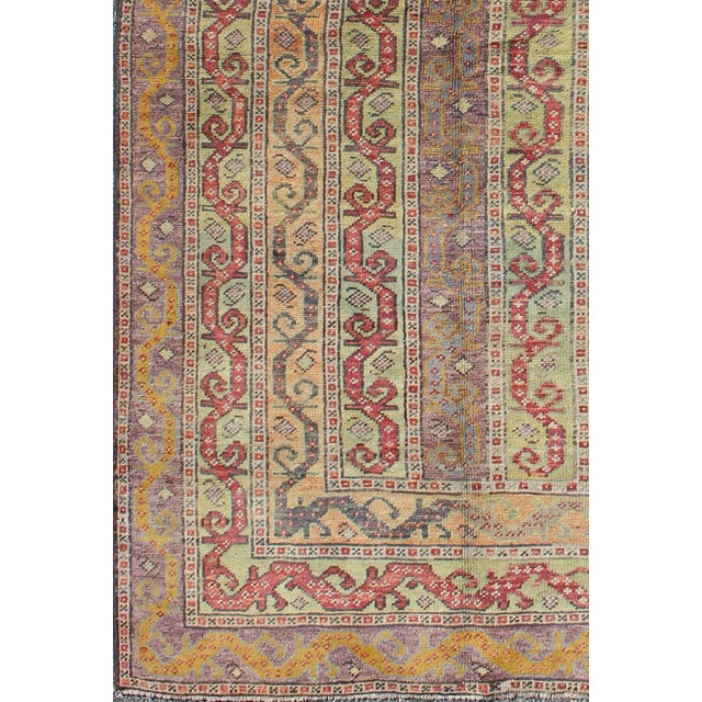 Modern Antique Turkish Rug With Vertical Stripe Design in Light Green, Red, Light Orange and Purple For Sale - Image 3 of 7