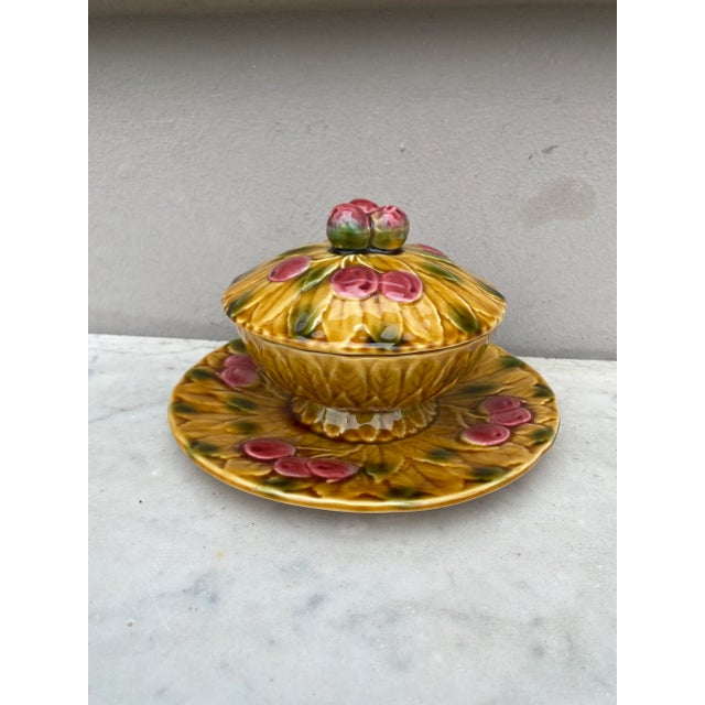 Majolica Trompe l'oeil basket with cherries handle signed Sarreguemines, circa 1940.