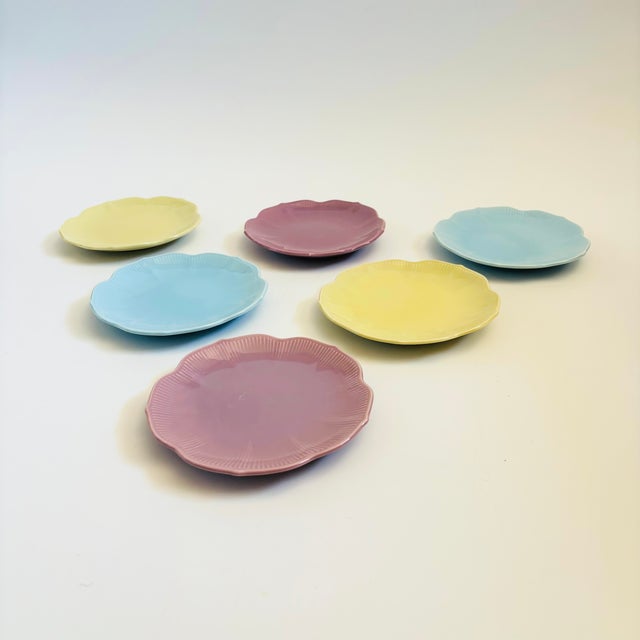 A set of 6 colorful ceramic vintage lotus plates, made by Lillian Vernon. Two of each color, finished in glossy pastel...
