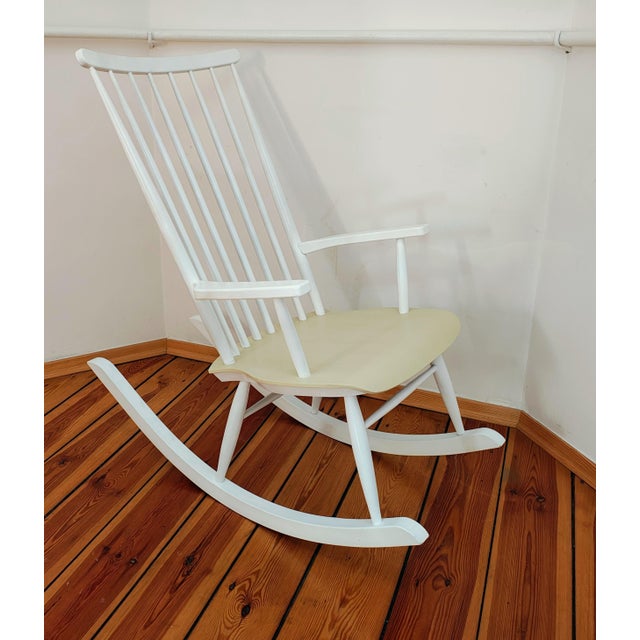 Vintage Rocking Chair from Varjosen Puunjalostus, Uusikylä, 1960s It combines modernity and timeless style. The armchair...