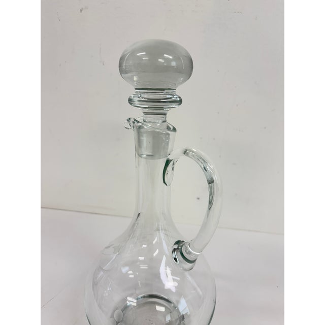 DESCRIPTION Vintage 1980s clear crystal decanter featuring an elegant bulbous form, long tapered neck, applied crystal...