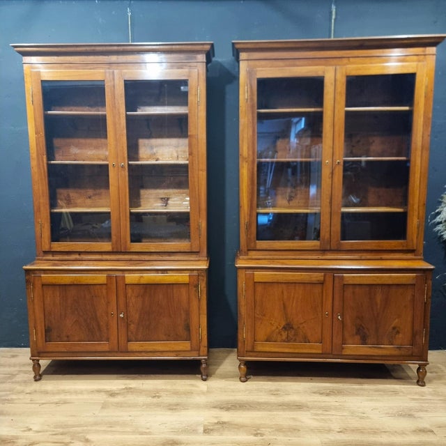 Pair of high-quality 1840 walnut sideboards and bookcases Authentic elegance for prestigious settings The pair of high-...