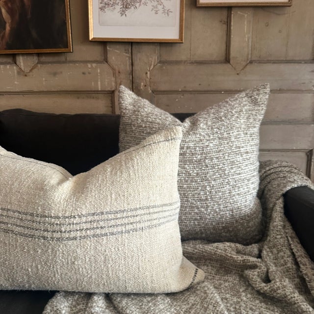 Woven in Belgium the Bell Pillow combines a fluffy boucle wool with a silky soft viscose/linen. Content: 41% Viscose / 19%...
