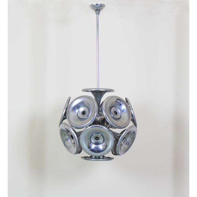 Sputnik Pendant in Chromed Metal, 1970s, in Good conditions. Designed 1970 to 1979 Up to 250V (Europe/UK Standard).The...