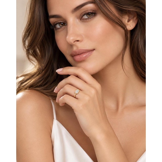 An authentic and sophisticated modern classic solitaire engagement or right-hand ring crafted in solid 14k yellow gold by...