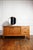 Oak veneer storage unit dating from the 1960s. Its design combines a storage space enclosed by two doors, three drawers,...