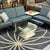 Elegantly curved tessellated stone coffee table. The table base is made of Mactan stone, a type of coral. It seems fitting...