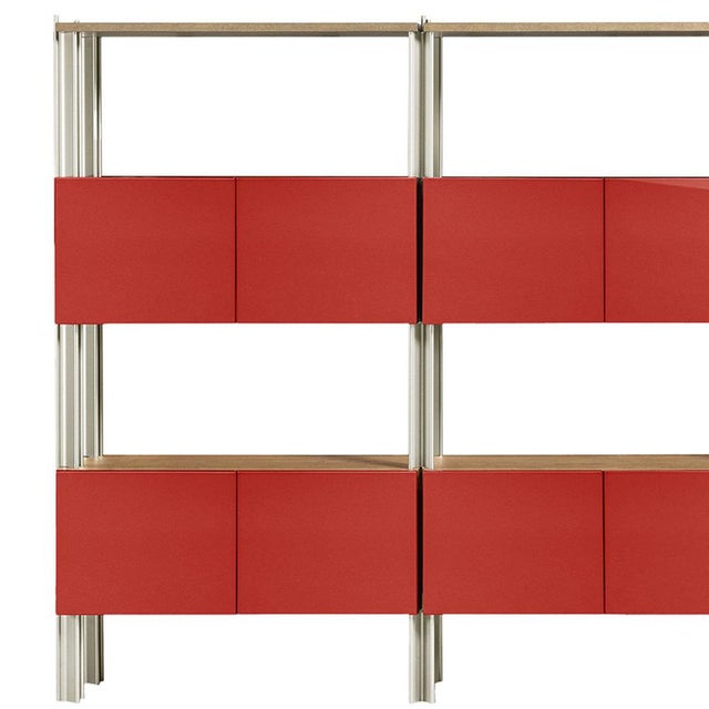 Defined by Robert Stadler's Flexor system, this bookshelf pairs a light extruded aluminum frame with horizontal shelves in...
