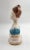 This dainty lady would be perfect atop a vanity table draped with jewelry, nightstand or tucked into a bookshelf. Marked...