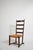 Wood and straw low chair, 1950s. Height: 104 cm - 40.94 in Length: 47 cm - 18.5 in Width: 50 cm - 19.69 in