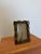 Brazilian mid-century modern chainlink bronze picture frame circa 1960s. The frame has an inset transparent acrylic photo...