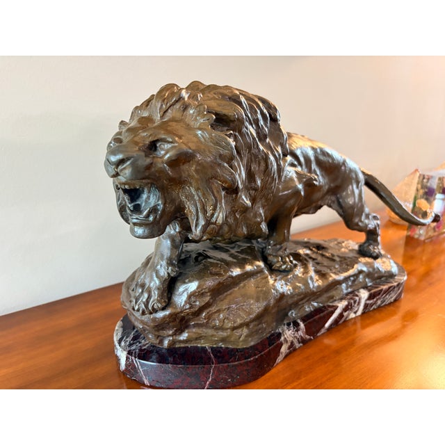 An exceptionally powerful and monumental antique French bronze sculpture titled "Lion Rugissant" (Roaring Lion) by the...