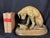 This is a bronze figurine titled Chien à la tortue (Dog with Tortoise), depicting a hound observing a turtle, originally...